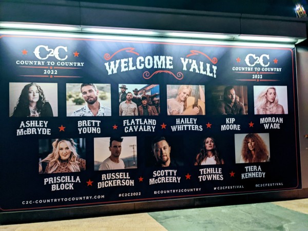 Artist pictures on welcome poster at C2C festival 2022